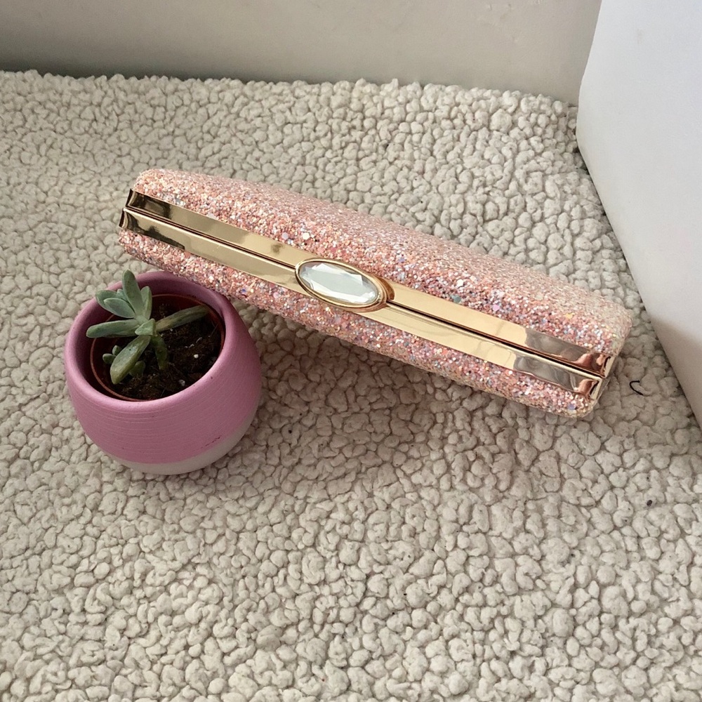 Sparkly pink and gold clutch with chain